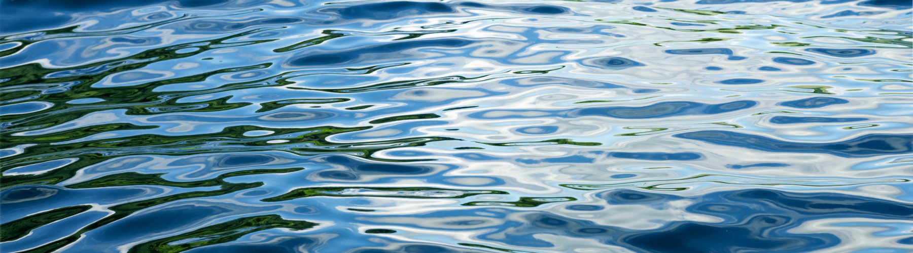 Undulating waves of pure water reflecting light patterns.